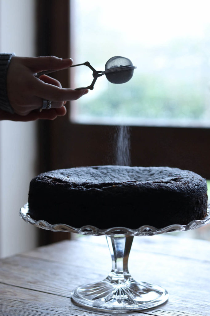 Beast cake getting a dusting of icing sugar