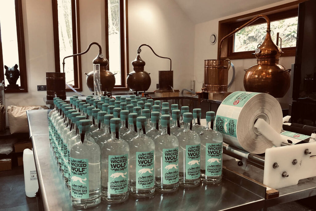 The distillery and bottles of Wicked Wolf Gin